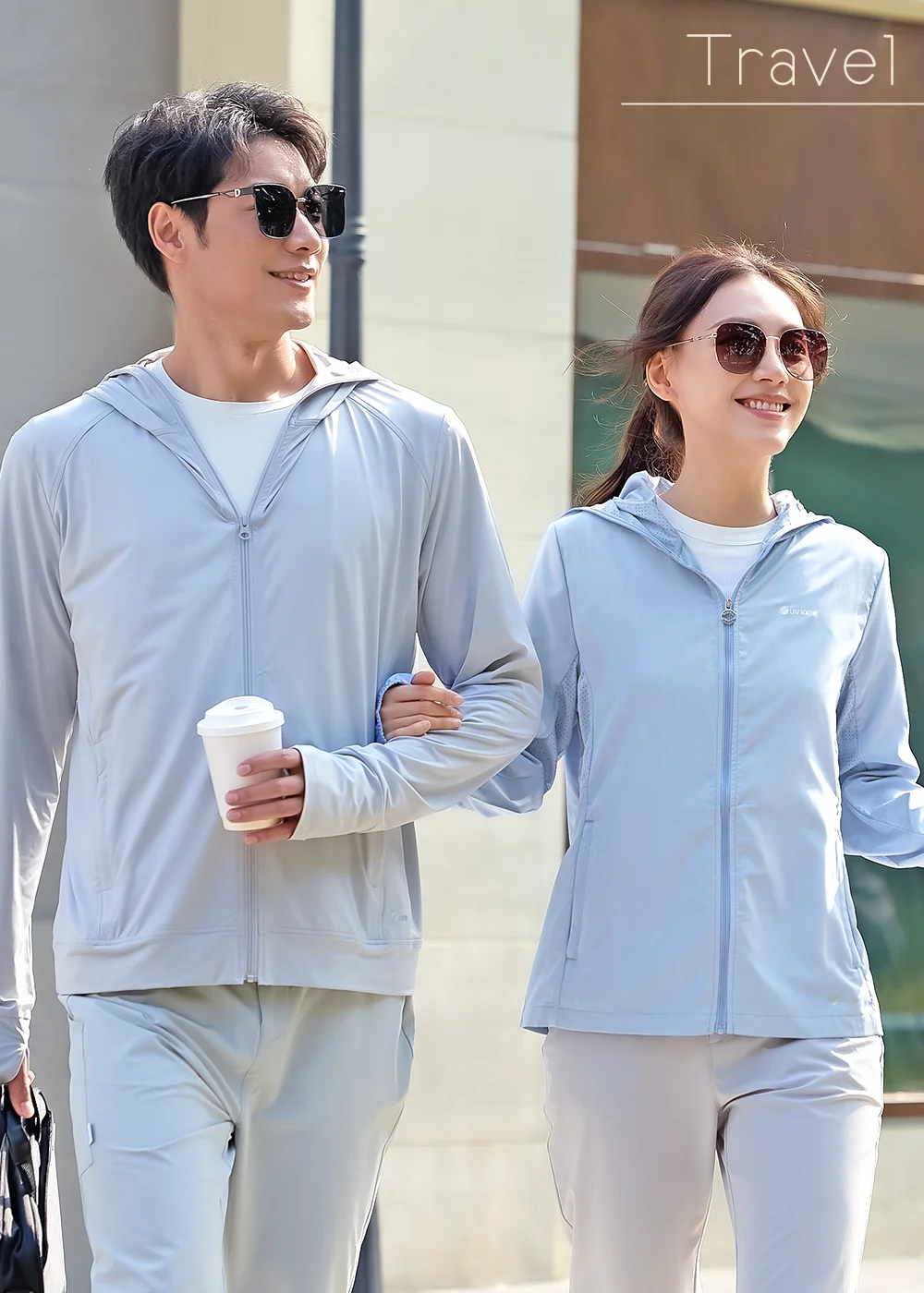 旅行系列防曬穿搭：男女情侶配戴偏光太陽眼鏡搭配防曬外套，享受戶外旅遊清爽時光。