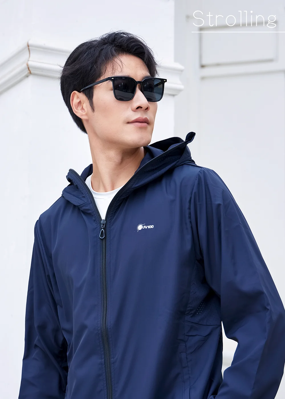 簡約男款太陽眼鏡：戶外散步或日常休閒配戴，深色極簡鏡框設計，展現男性時尚機能感。
